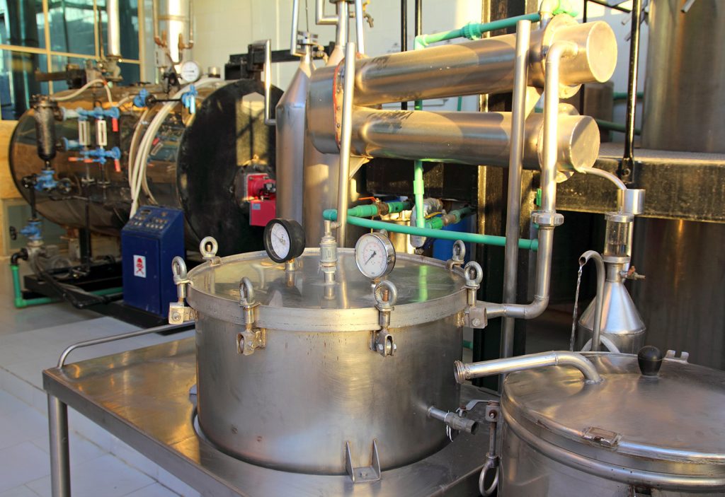 distillation of essential oils in a factory