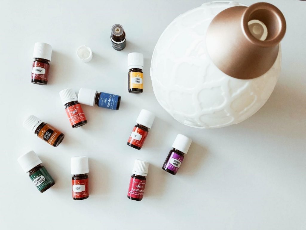 essential oil bottles and diffuser