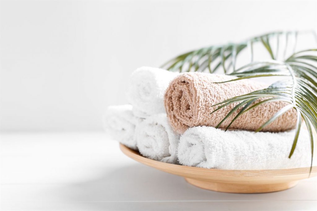 stack of cloths in a bathroom spa